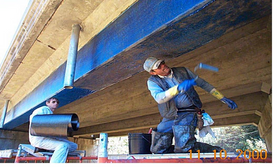 workers painting underside of bridge